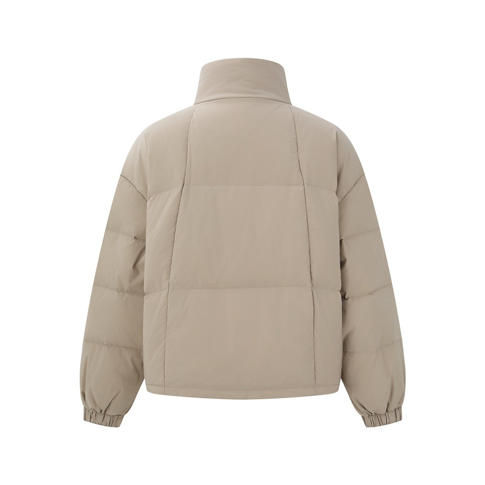 Back view of a taupe puffer jacket with a high collar, horizontal quilted panels and elastic cuffs.