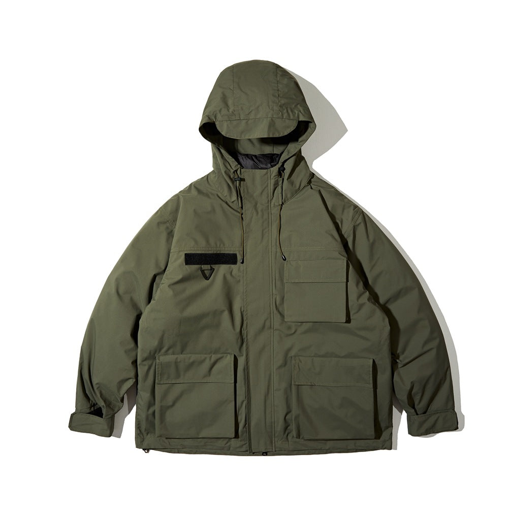 Front view of an olive hooded jacket with a full-length zipper, drawcords, and multiple flap pockets.