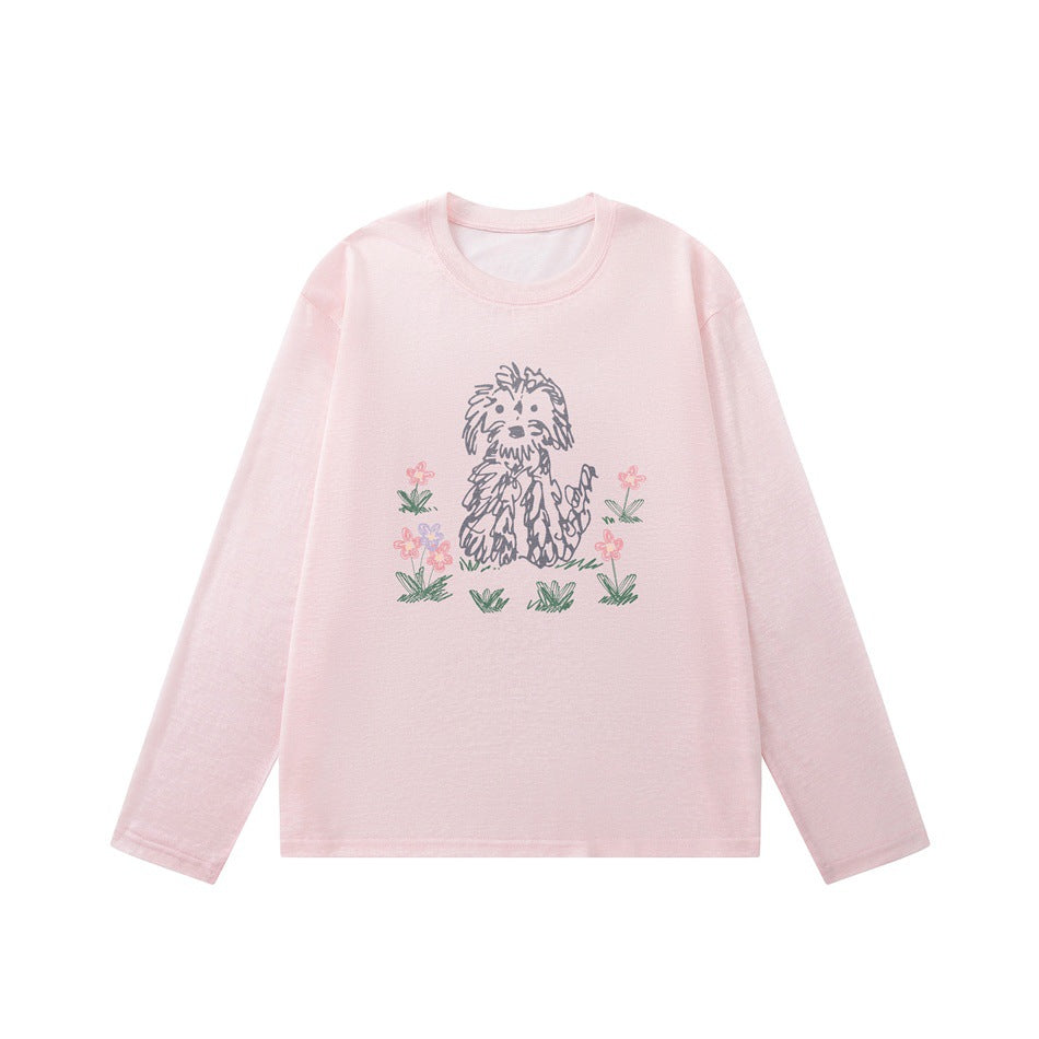 Pink long-sleeve crew neck top with a gray sketch-style dog and flower print on the front, flat lay