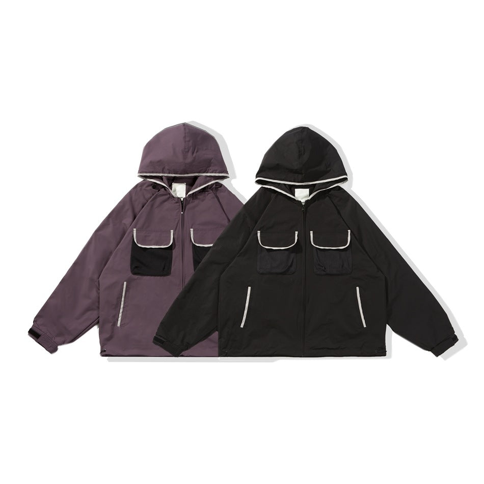 Two hooded jackets shown from the front: one plum and one black, both with light-trimmed chest pockets.
