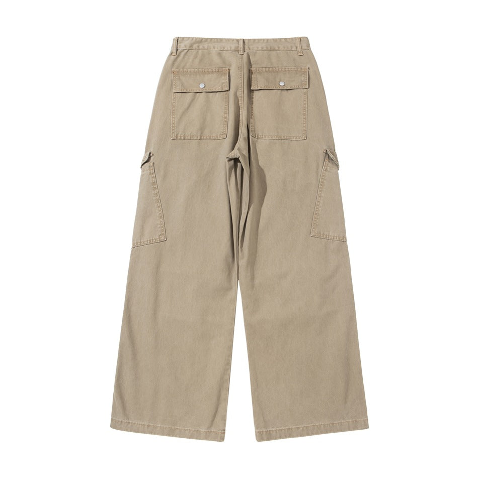 Back view of taupe wide-leg cargo pants with two snap-flap pockets and large side pockets.
