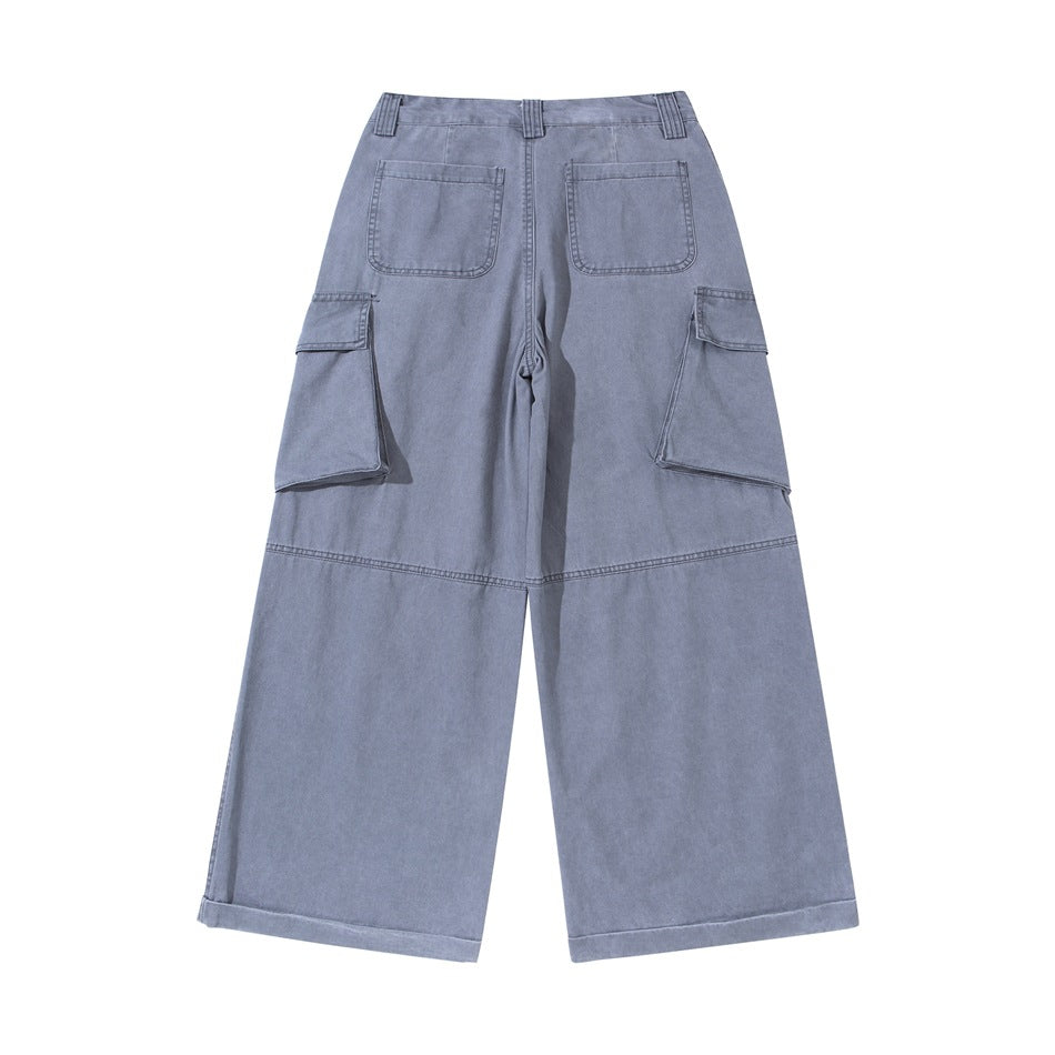 Back view of blue-gray wide-leg cargo pants showing two patch pockets, side cargo pockets and cuffed hems