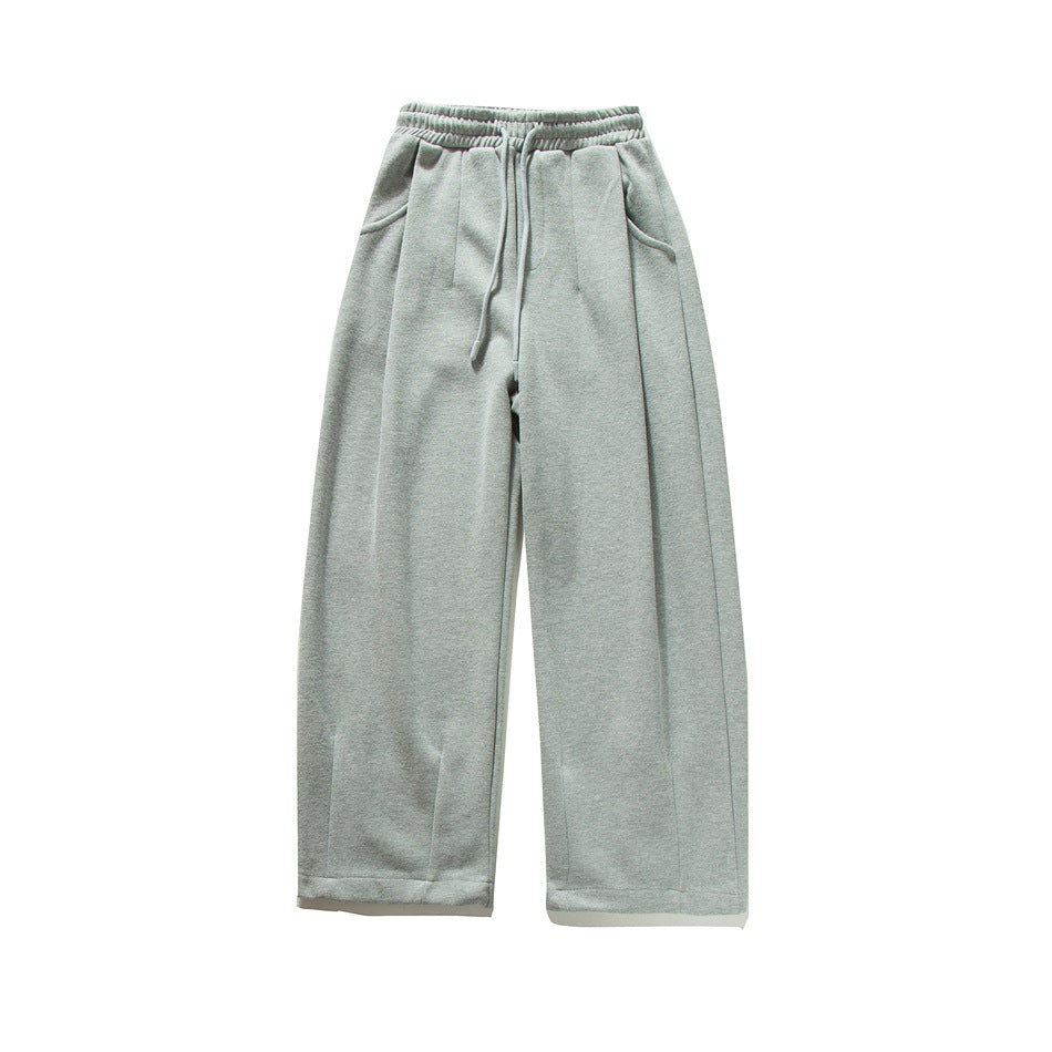 Heather gray wide-leg drawstring sweatpants, flat lay front view with side pockets and front pintuck creases