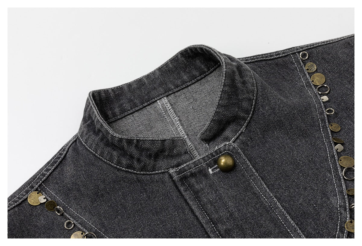 Close-up of the jacket collar, front placket button, contrast stitching, and decorative metal charms along the seams.