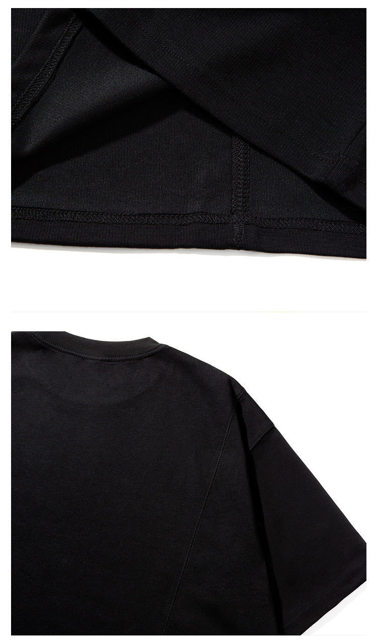 Close-ups of black T-shirt hem stitching and the back shoulder and sleeve seams.