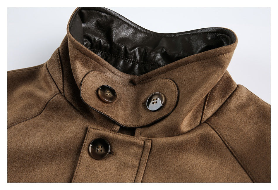 Close-up of the jacket's raised collar, dark inner trim and large front buttons.