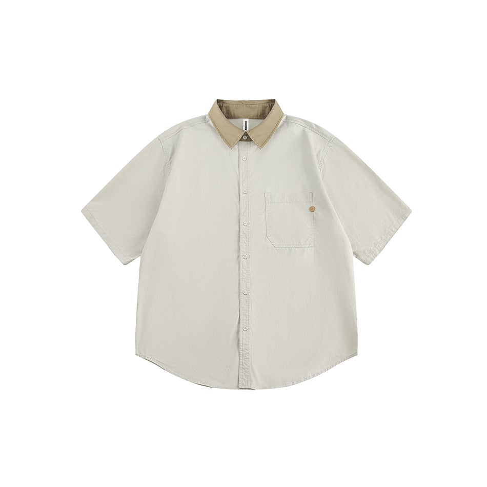 Light gray short-sleeve button-up shirt with khaki contrast collar and chest pocket, flat lay