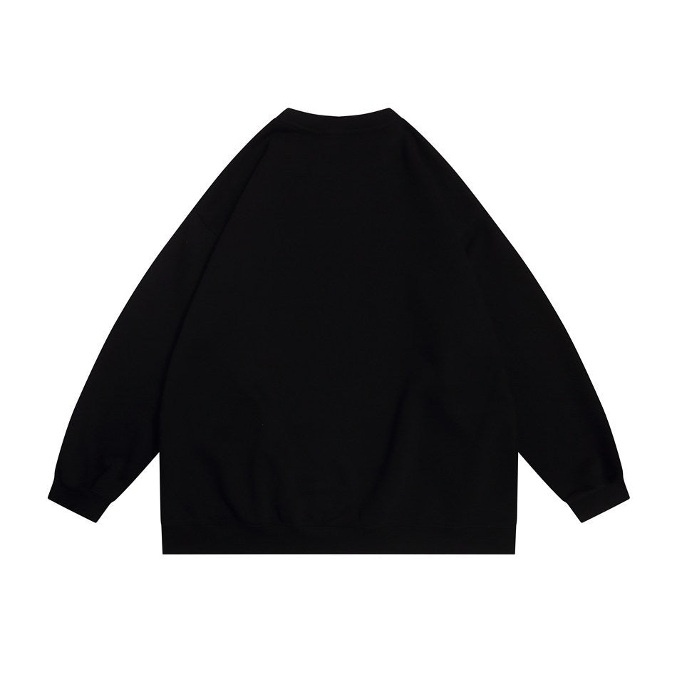 Back view of a plain black crewneck sweatshirt with long sleeves and ribbed cuffs and hem.