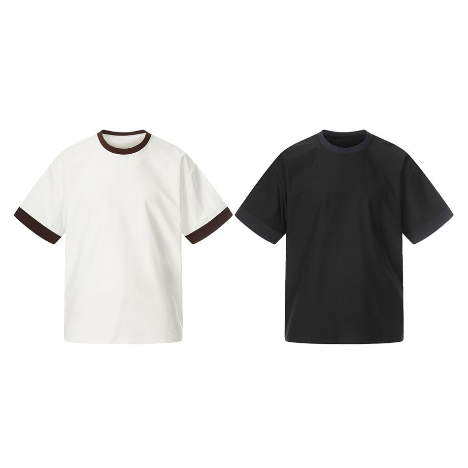 Two short-sleeve crew-neck T-shirts: white with dark brown trim and black with dark navy trim.