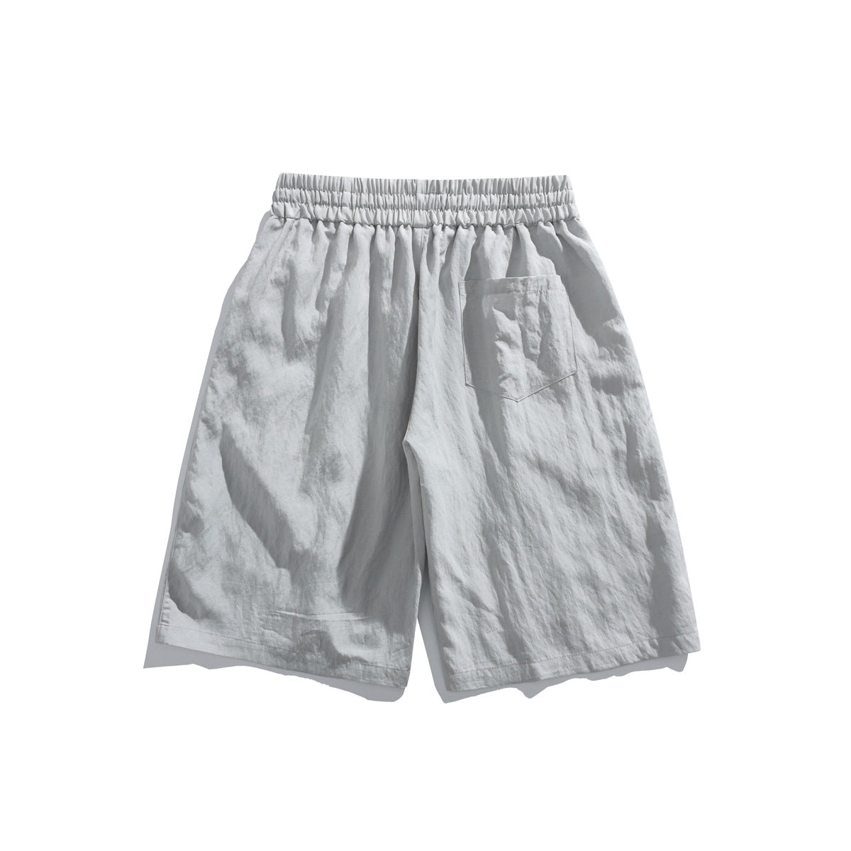 Light gray knee-length shorts back view with elastic waistband and a single patch pocket