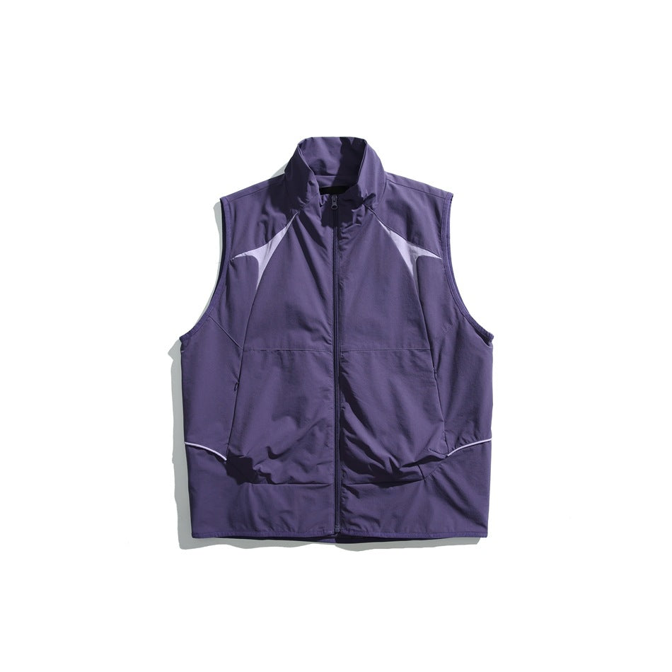 Purple zip-front stand-collar vest with light lavender contrast shoulder panels, flat lay on white background