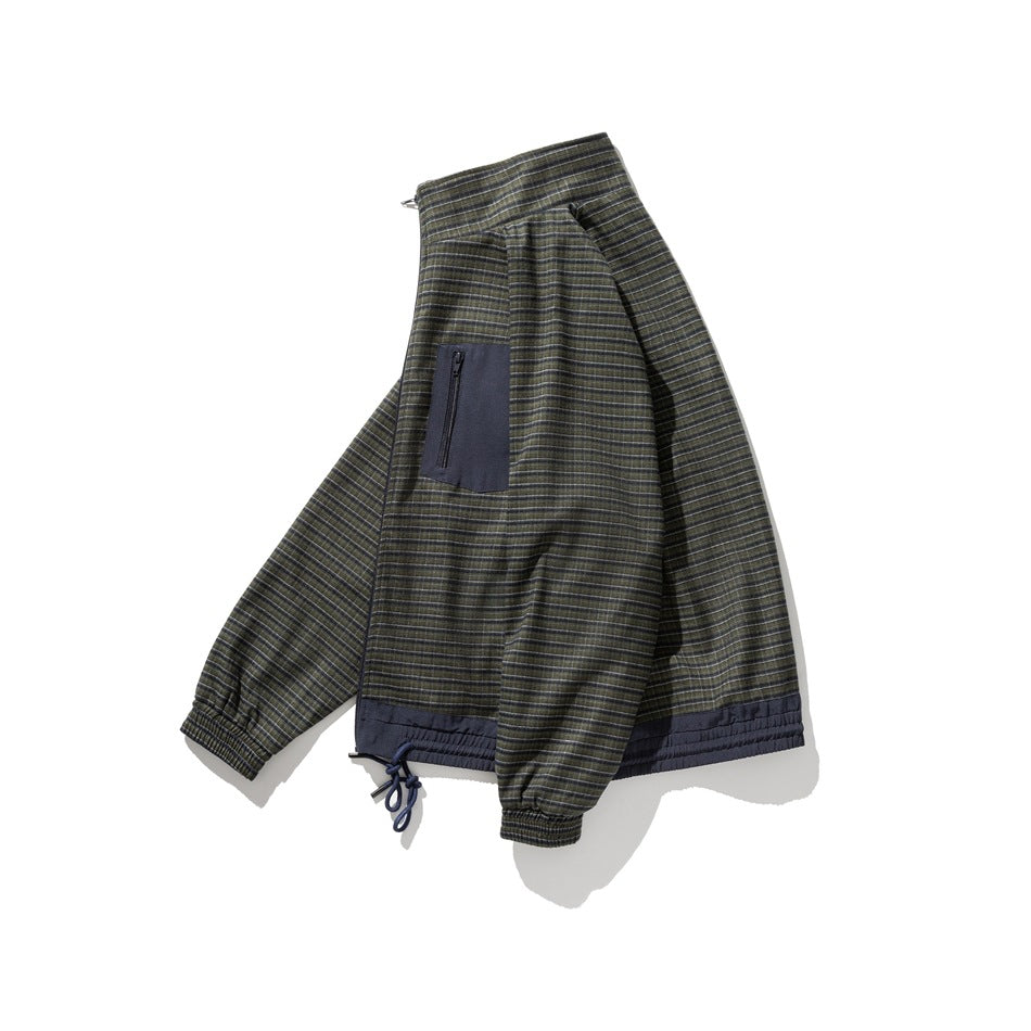 Front view of a dark olive and navy striped jacket with a high collar, zip pocket, and navy drawcord hem.