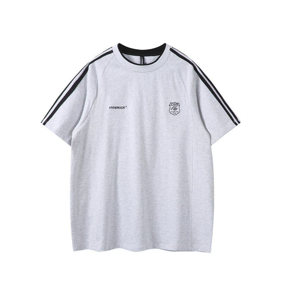 Light gray raglan T-shirt with black collar trim, black shoulder stripes and embroidered chest crest, front view