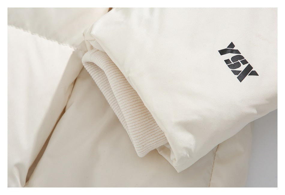 Cream jacket sleeve with a ribbed cuff and black printed logo.