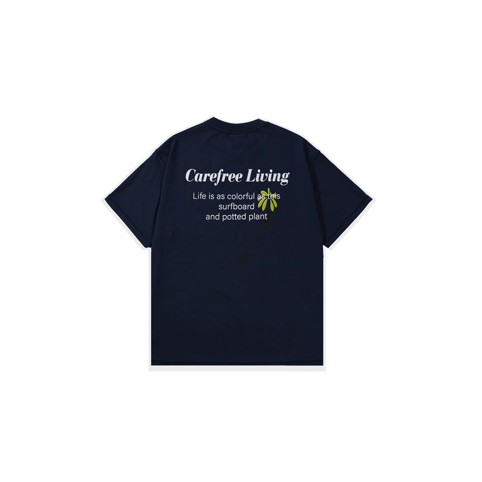 Navy short-sleeve T-shirt back view with white Carefree Living text and green plant graphic