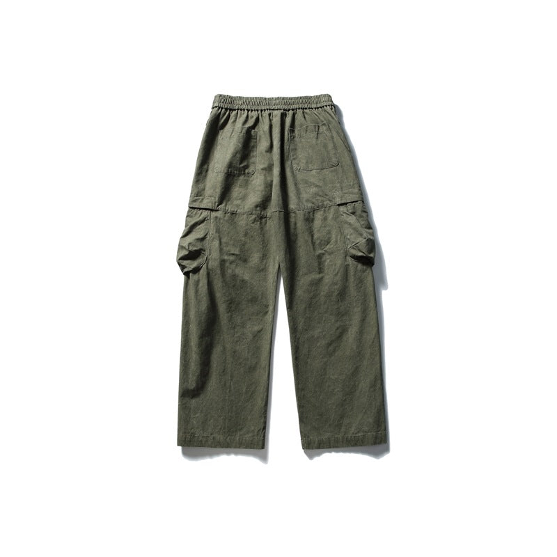 Green wide-leg cargo pants back view with elastic waistband, two back patch pockets and side cargo pockets