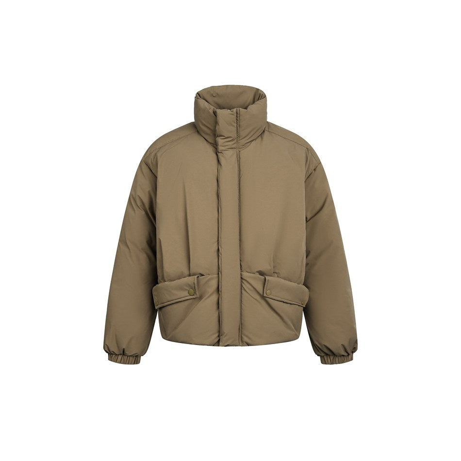 Olive green puffer jacket with stand collar, snap-flap hip pockets and elastic cuffs, front view on white background