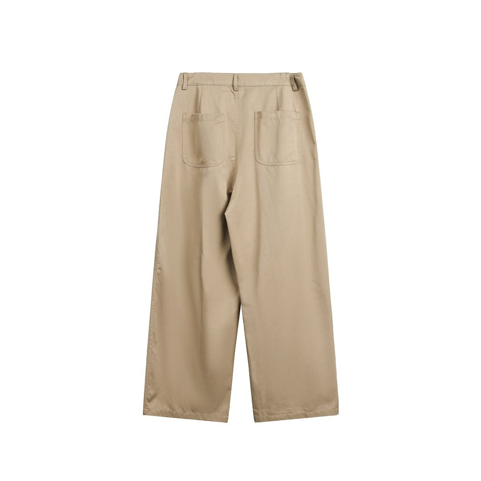 Back view of wide-leg beige trousers with two patch pockets and belt loops.