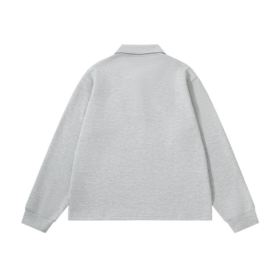 Back view of a light heather-gray long-sleeve collared pullover with ribbed cuffs.