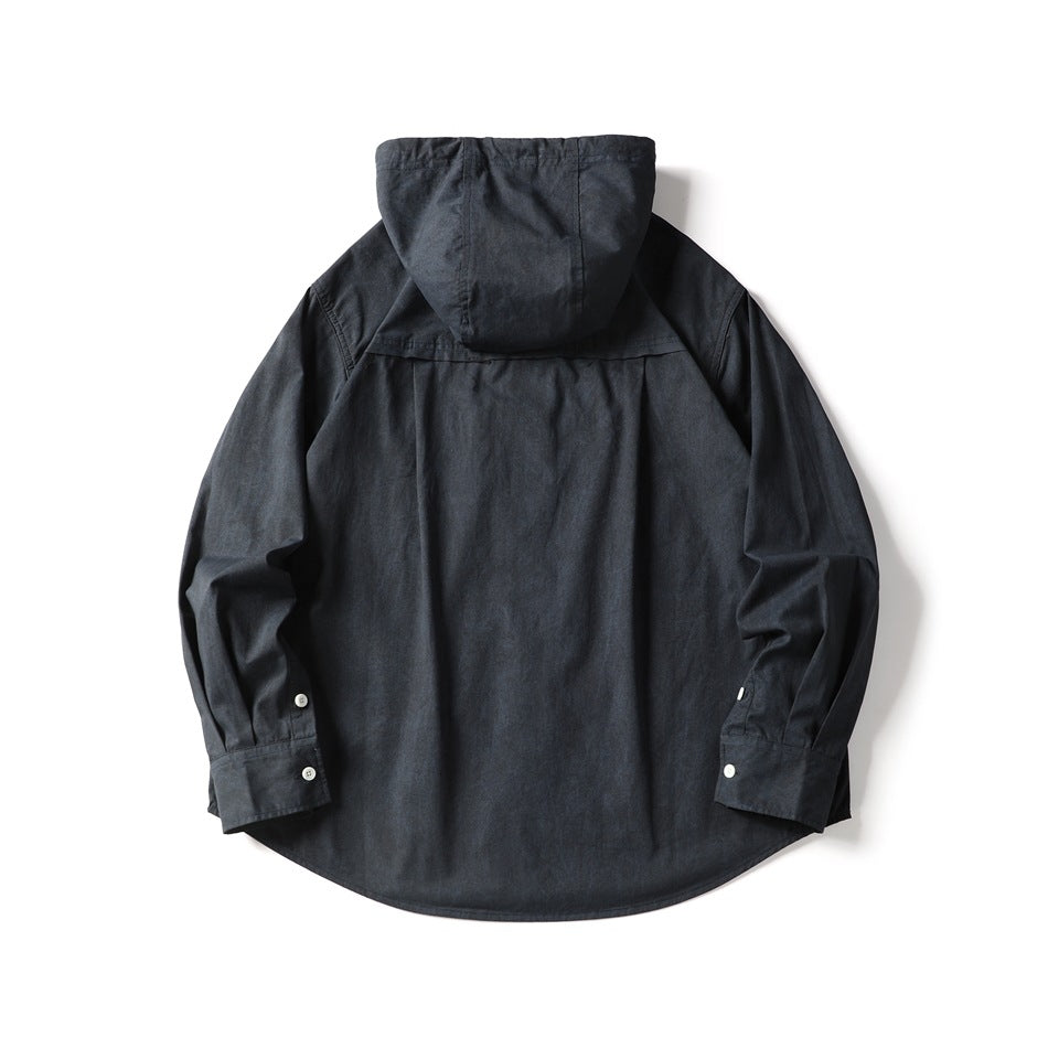 Back view of a charcoal hooded shirt with long sleeves, button cuffs, and a curved hem.