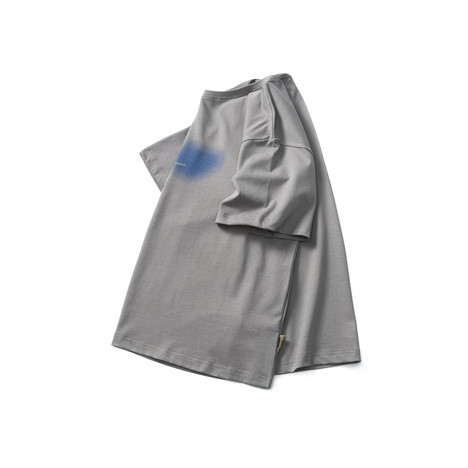 Gray short-sleeve crew-neck T-shirt arranged flat, with a blue chest graphic and small lettering.