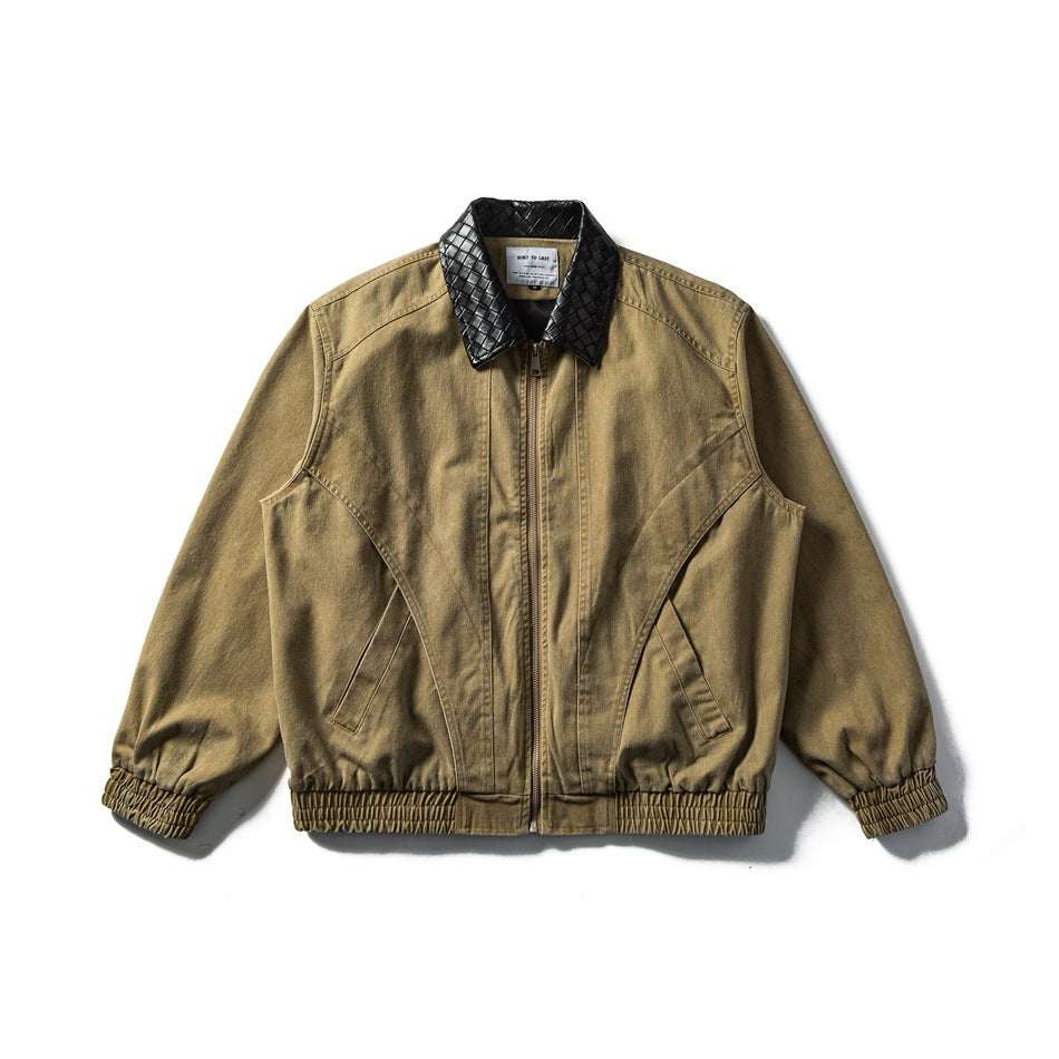 Khaki zip-front jacket with black woven-pattern collar, curved front seams and elastic hem and cuffs, flat lay