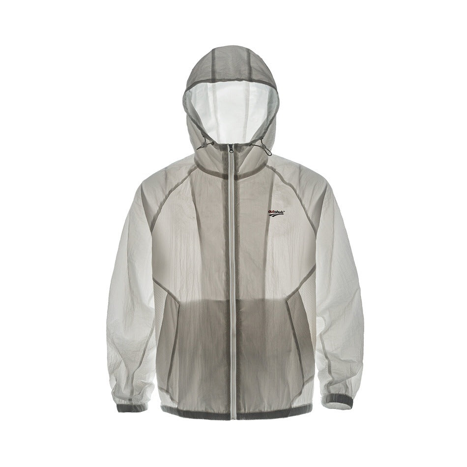 Backlit translucent view of a white hooded zip jacket showing internal seams, pocket shapes and hood structure
