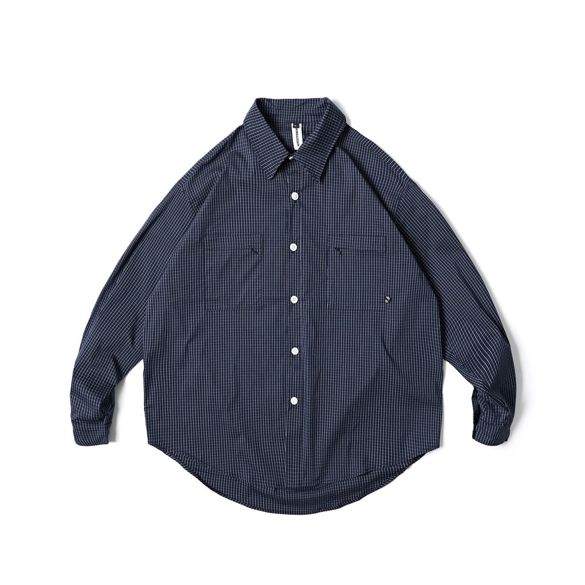 Navy long-sleeve button-front shirt with fine white grid check, white buttons and two chest pockets, flat lay
