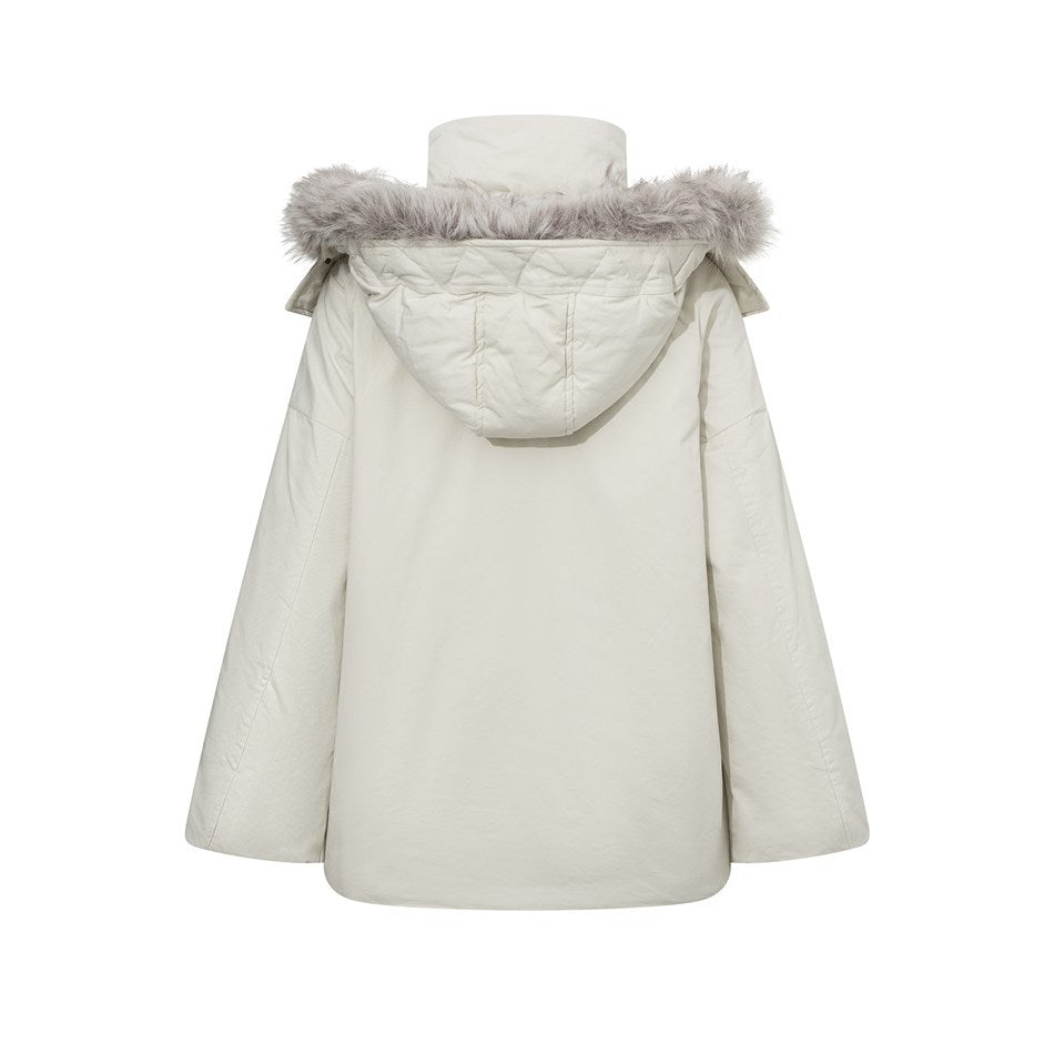 Back view of beige hooded jacket showing quilted hood, gray fleece-like trim and wide sleeves