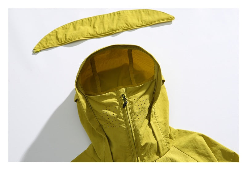 Close-up of the yellow jacket's hood, showing perforated panels, a front zipper, and a separate curved hood piece above.