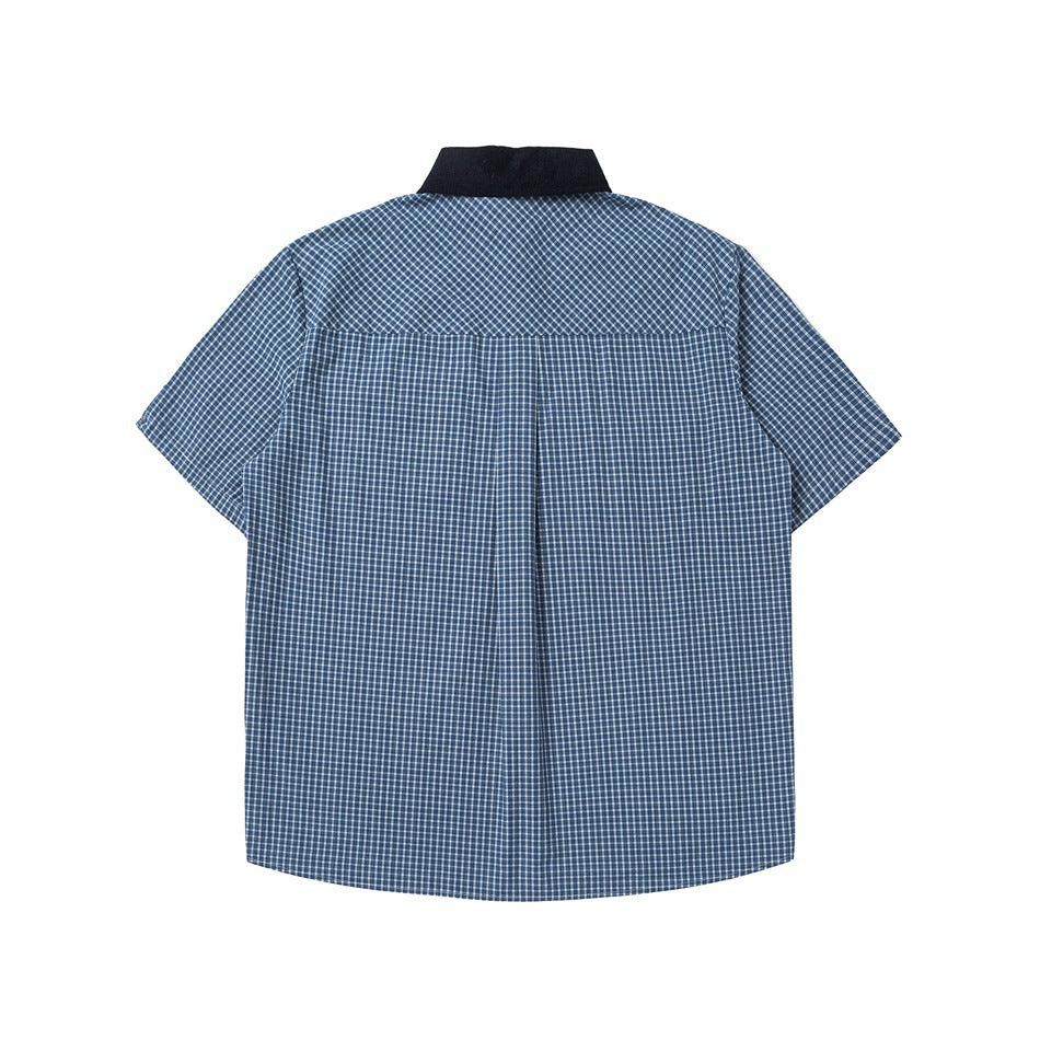 Back view of a blue-and-white checked short-sleeve shirt with a dark navy collar and center pleat.