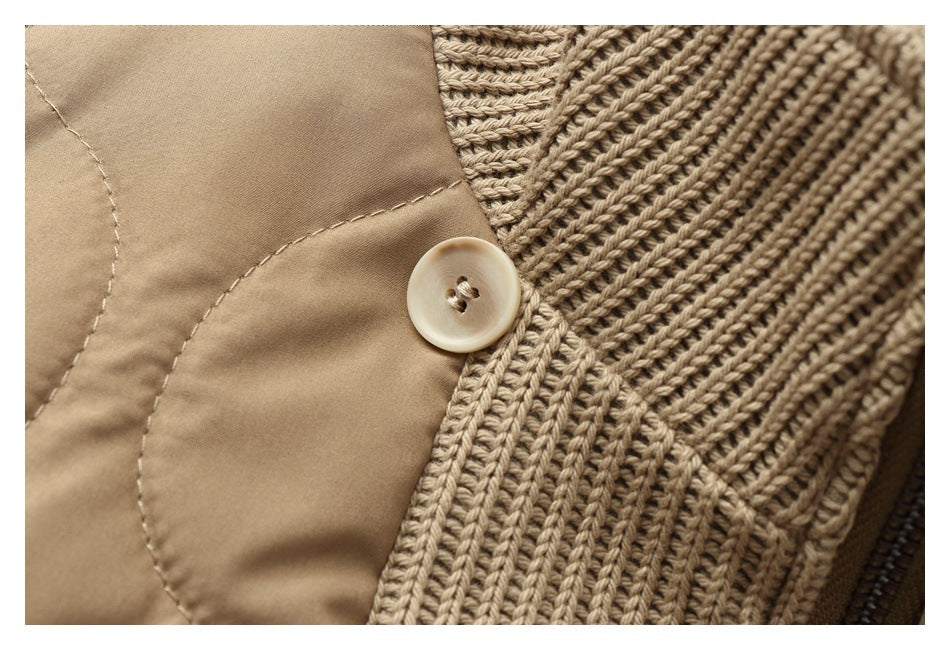 Close-up of a tan quilted jacket panel meeting a ribbed knit section with a light button.