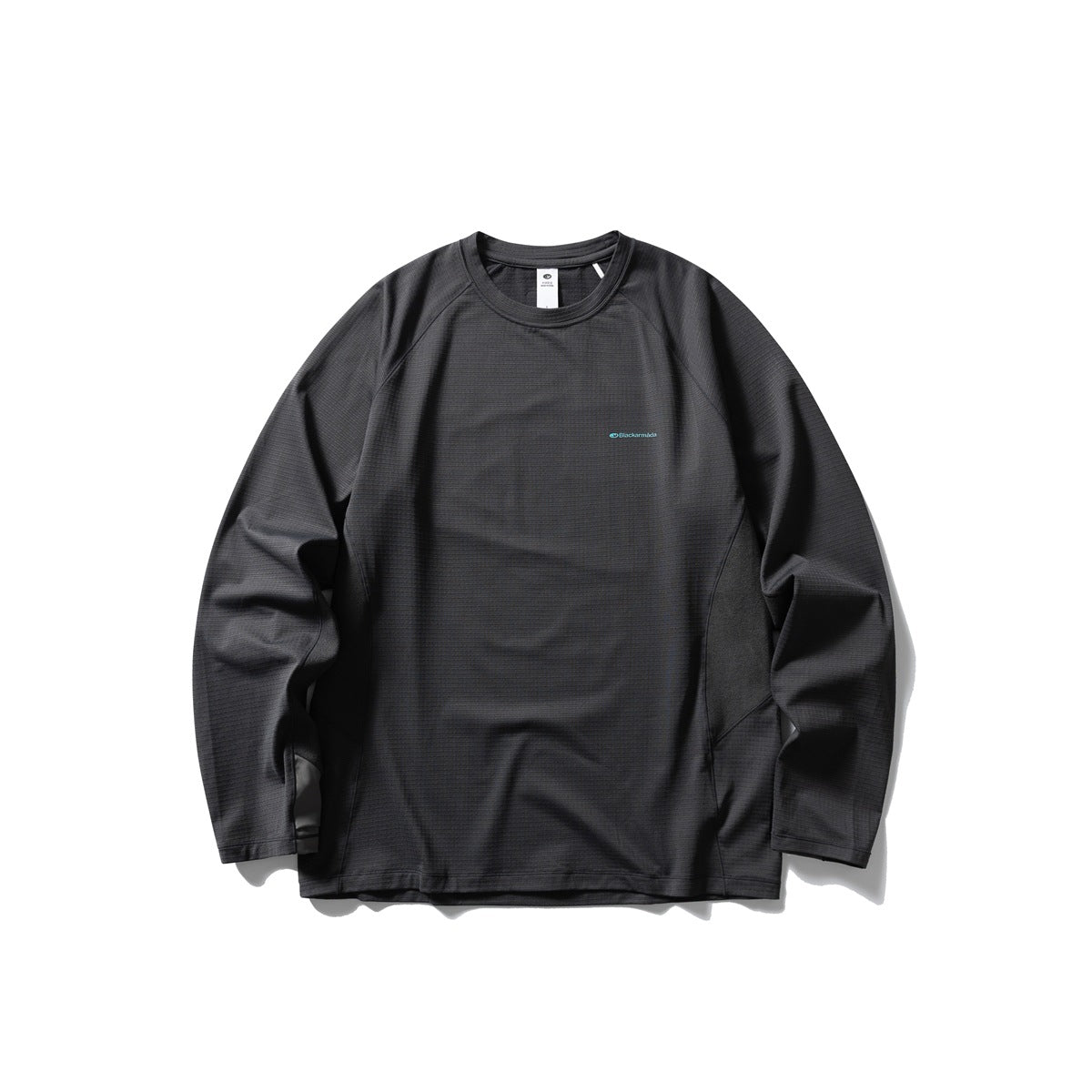 Charcoal gray long-sleeve crew-neck top with raglan sleeves and a small teal chest print, flat front view