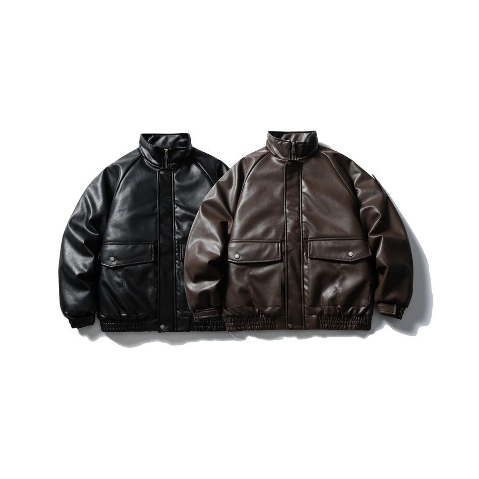 Two front-facing jackets side by side, one black and one dark brown, with stand collars and flap pockets.