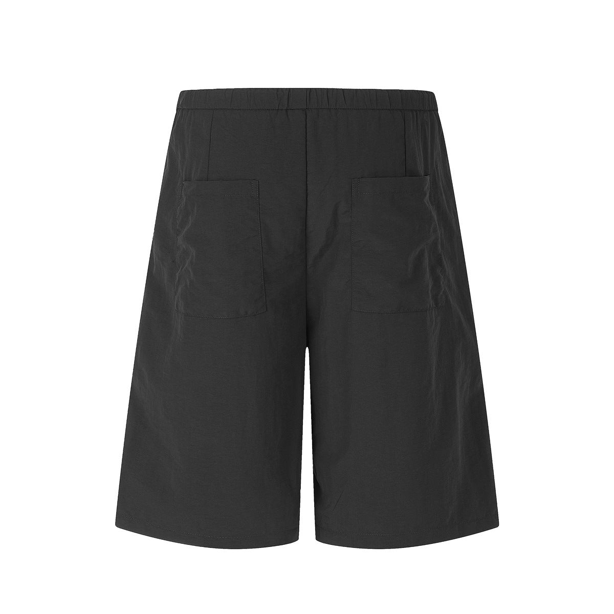 Back view of black, wide-leg shorts with an elastic waistband and two patch pockets.