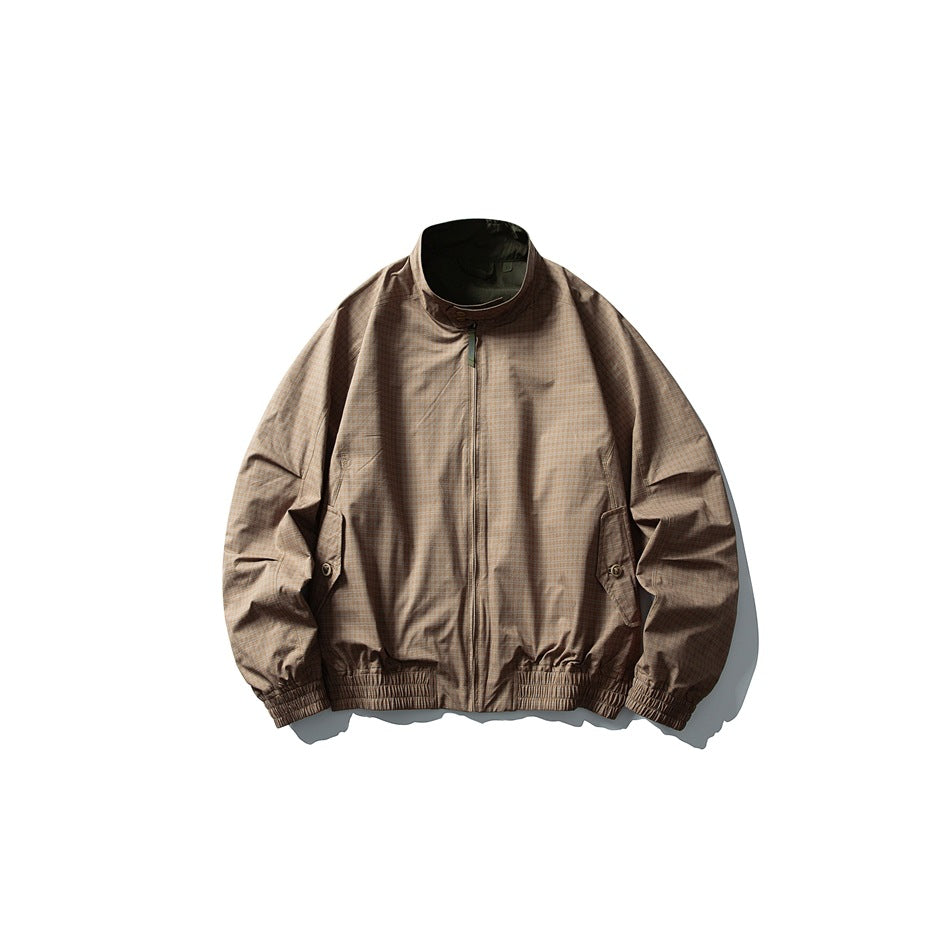 Bronze brown checked stand-collar zip jacket flat lay with flap pockets and elastic cuffs