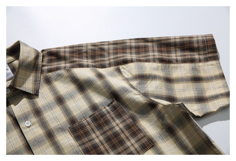 Flat lay of a beige plaid button-front shirt with a contrasting brown plaid chest pocket and collar.
