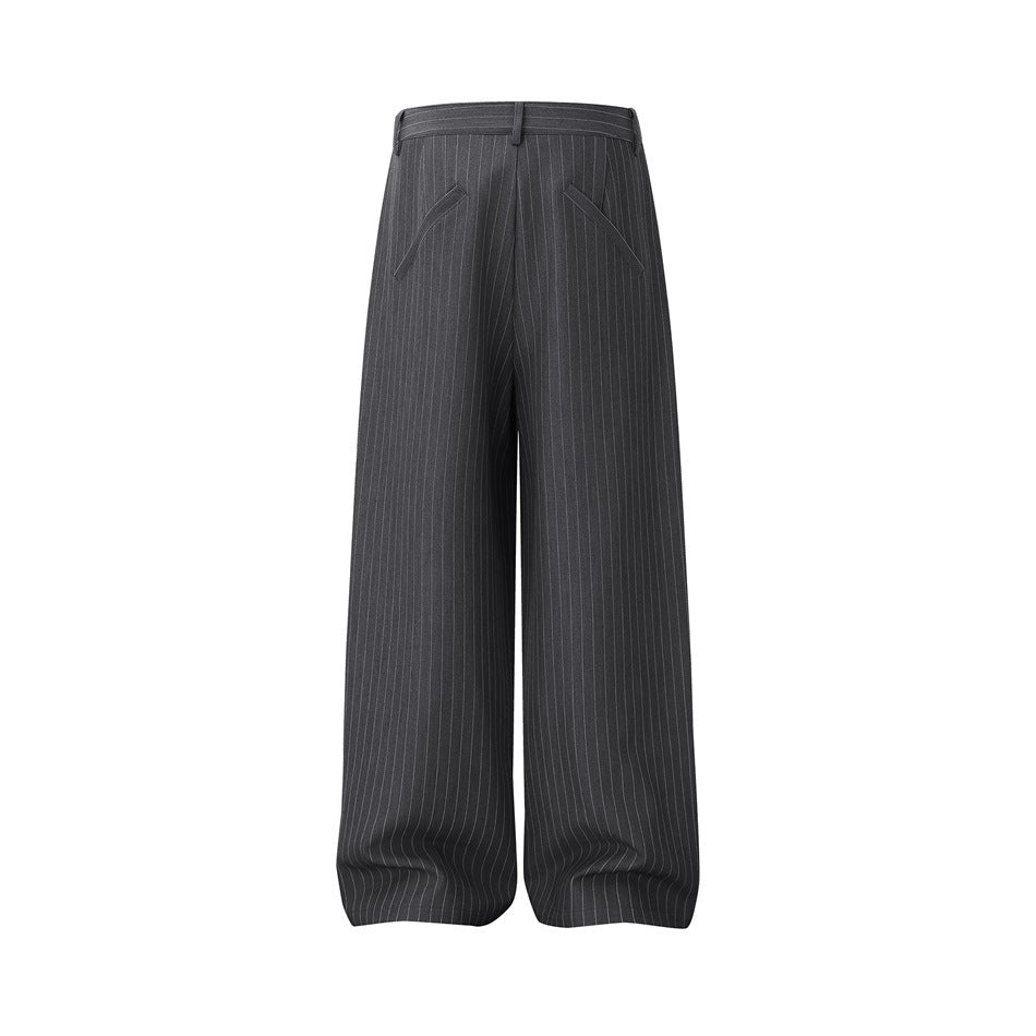 Full front view of charcoal pinstripe trousers with a wide leg, pleats, belt loops, and angled pockets.