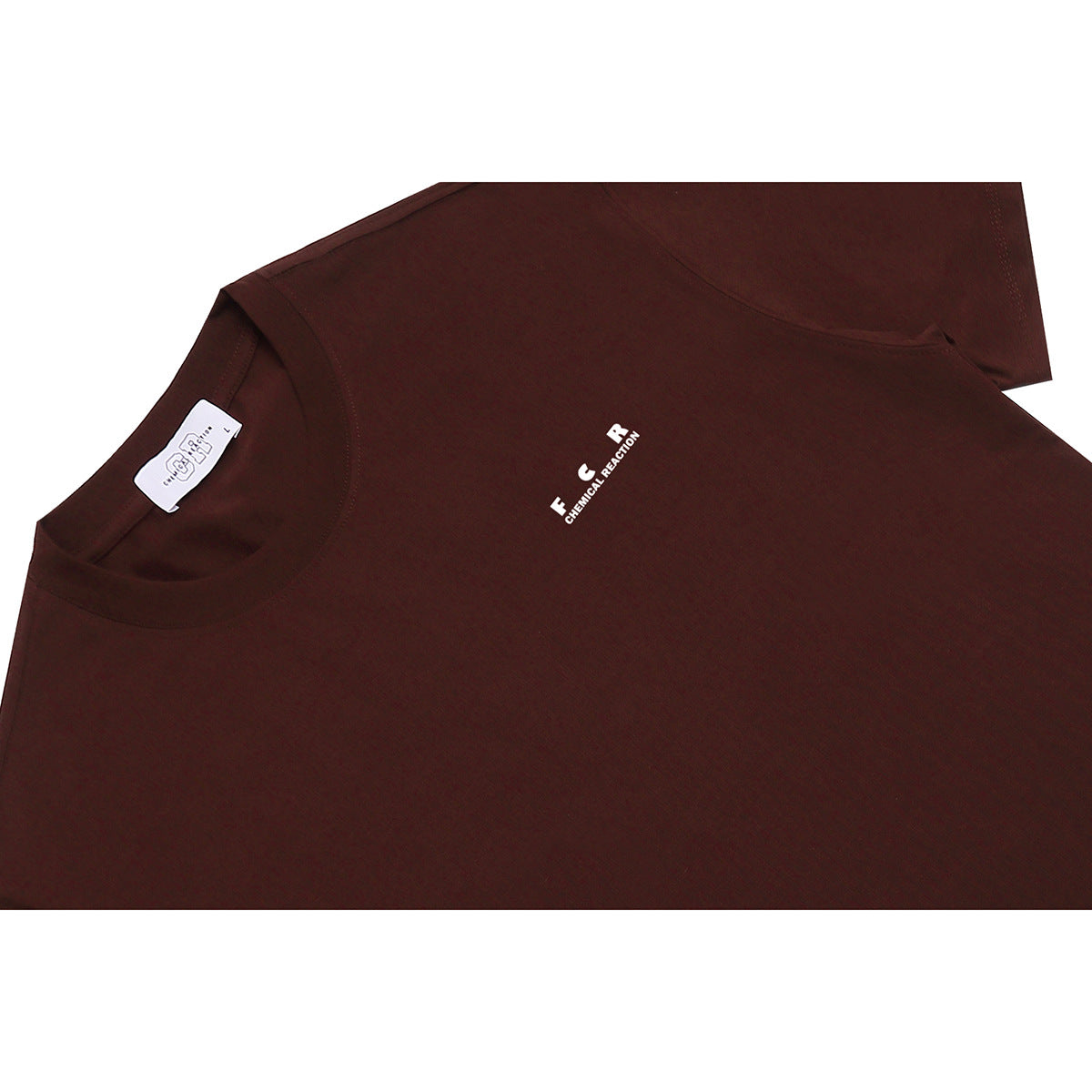 Close-up of a dark burgundy T-shirt collar and chest with small white lettering.