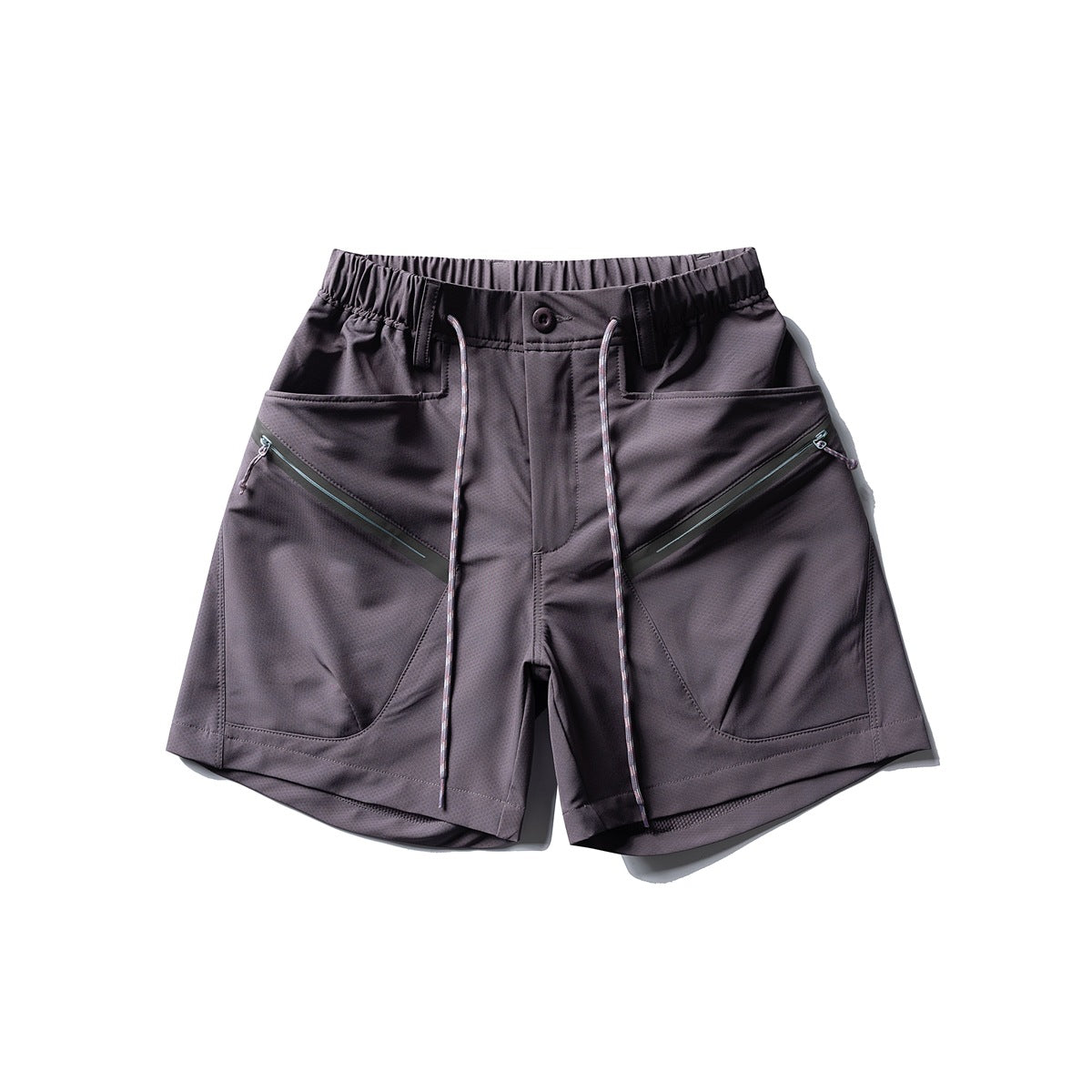 Dark purple wide-leg shorts with elastic waist, drawcord and diagonal zipper front pockets, flat lay