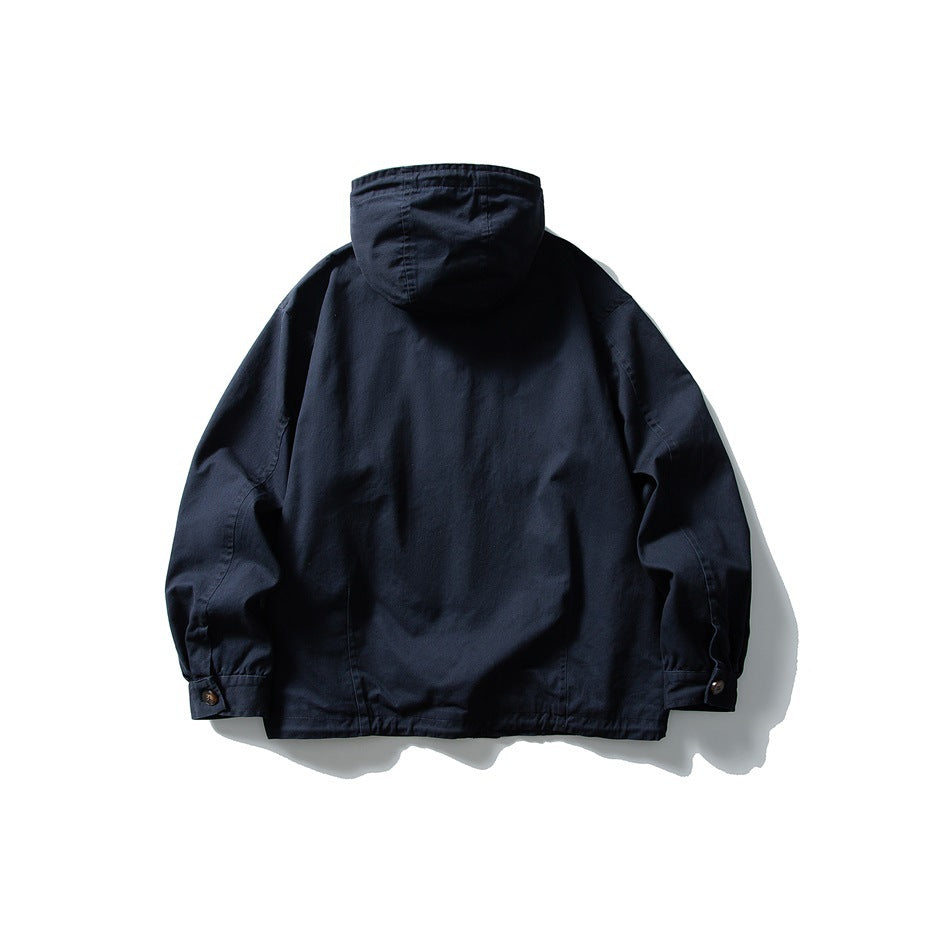 Back view of a dark navy hooded jacket with long sleeves and buttoned cuffs, displayed flat on white.