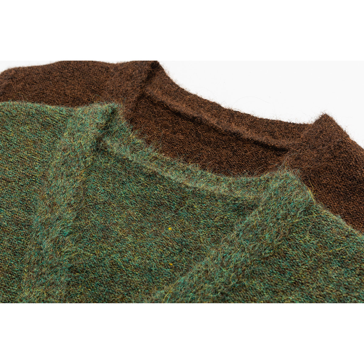 Close-up of fuzzy green-brown knit fabric layers, showing the mottled texture and edge.