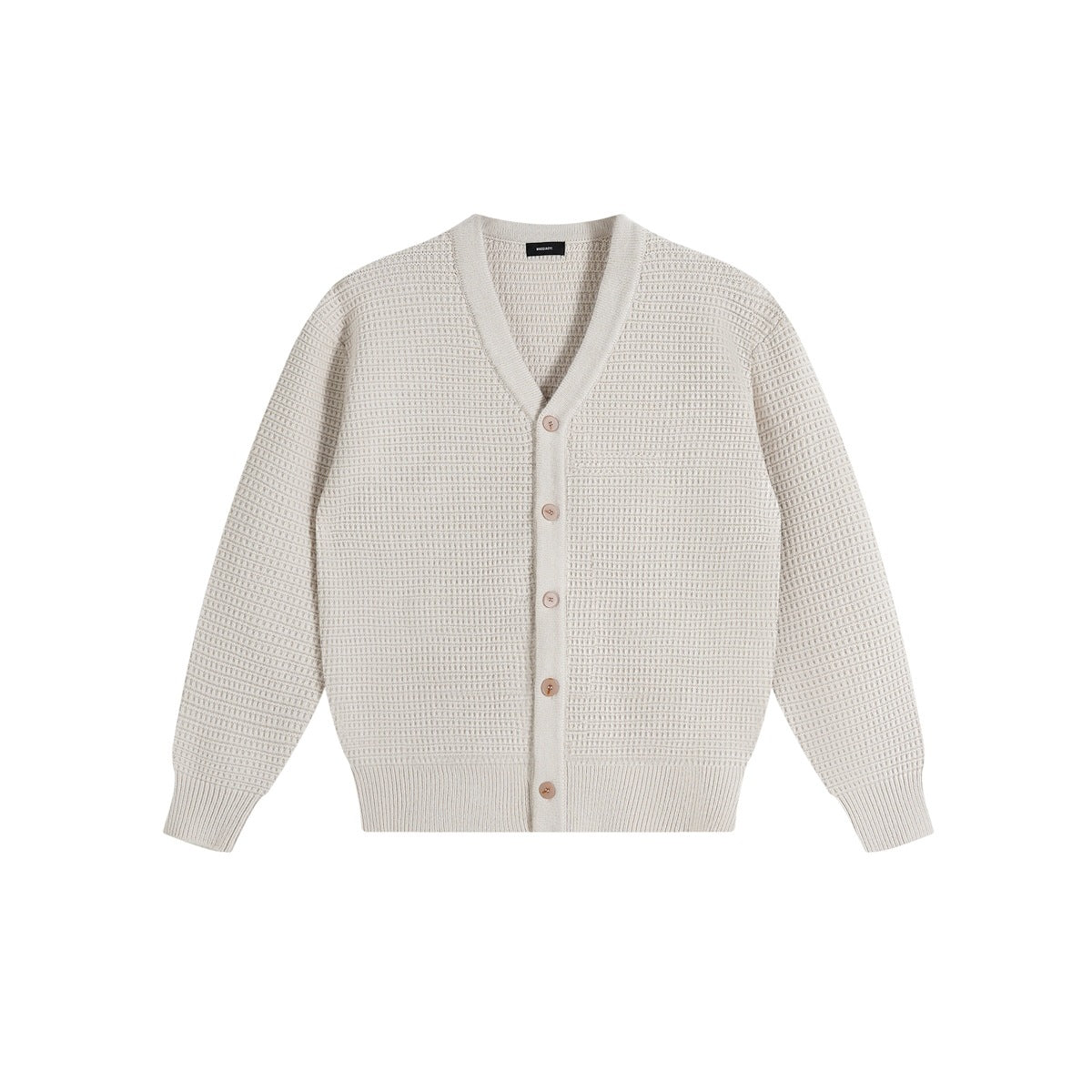 Apricot beige waffle-knit V-neck button-front cardigan with ribbed hem and cuffs, flat lay on white background