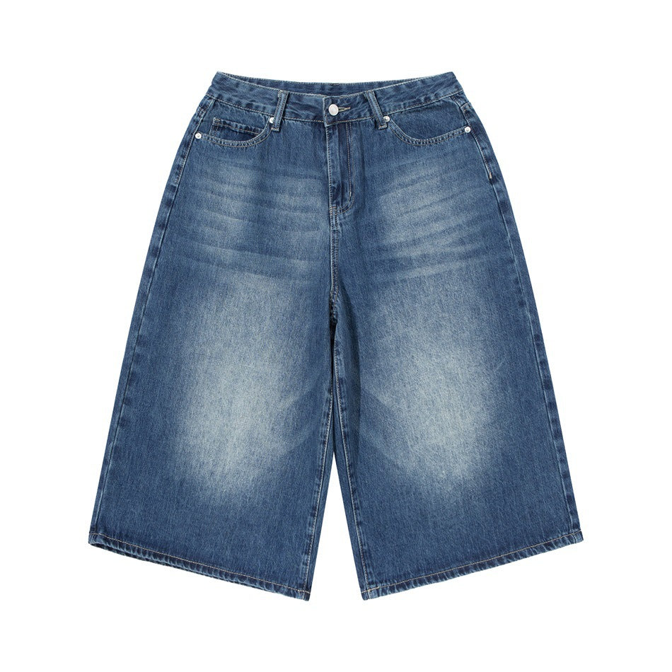 Denim blue whiskered wide-leg cropped denim pants, flat front view on white background