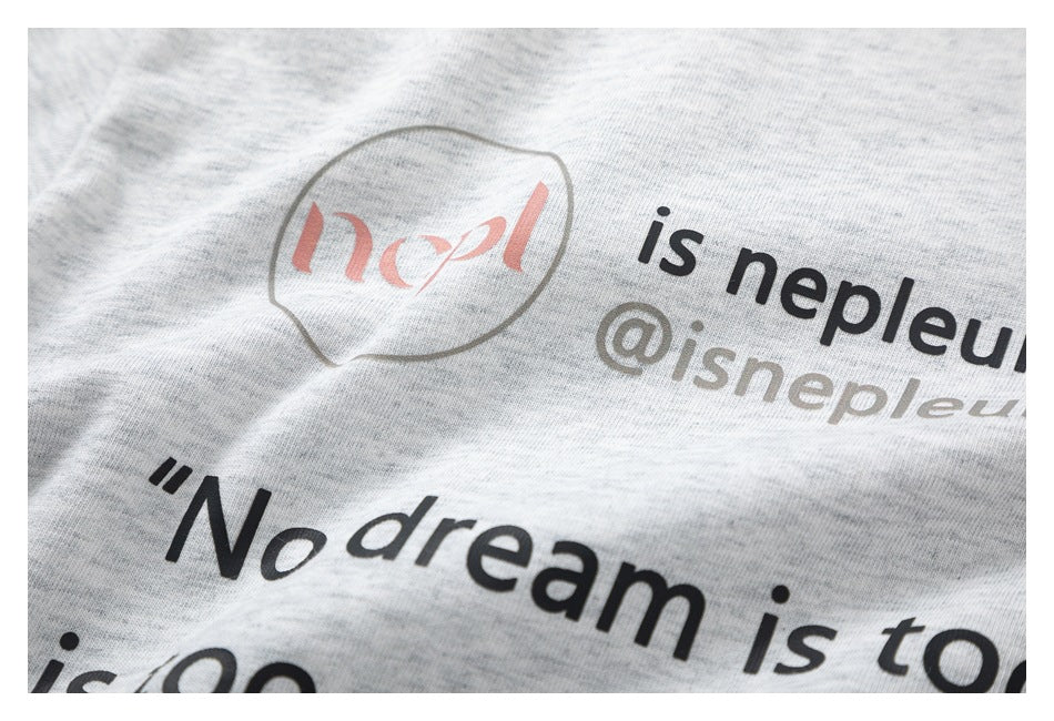 Close-up of the T-shirt's printed English lettering on light gray heather fabric.