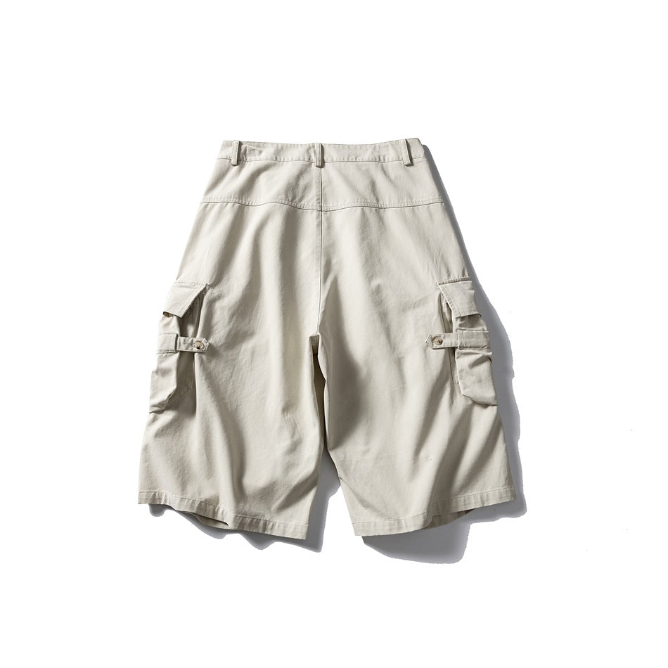 Off-white knee-length cargo shorts, back view, with yoke seam, belt loops and side flap pockets