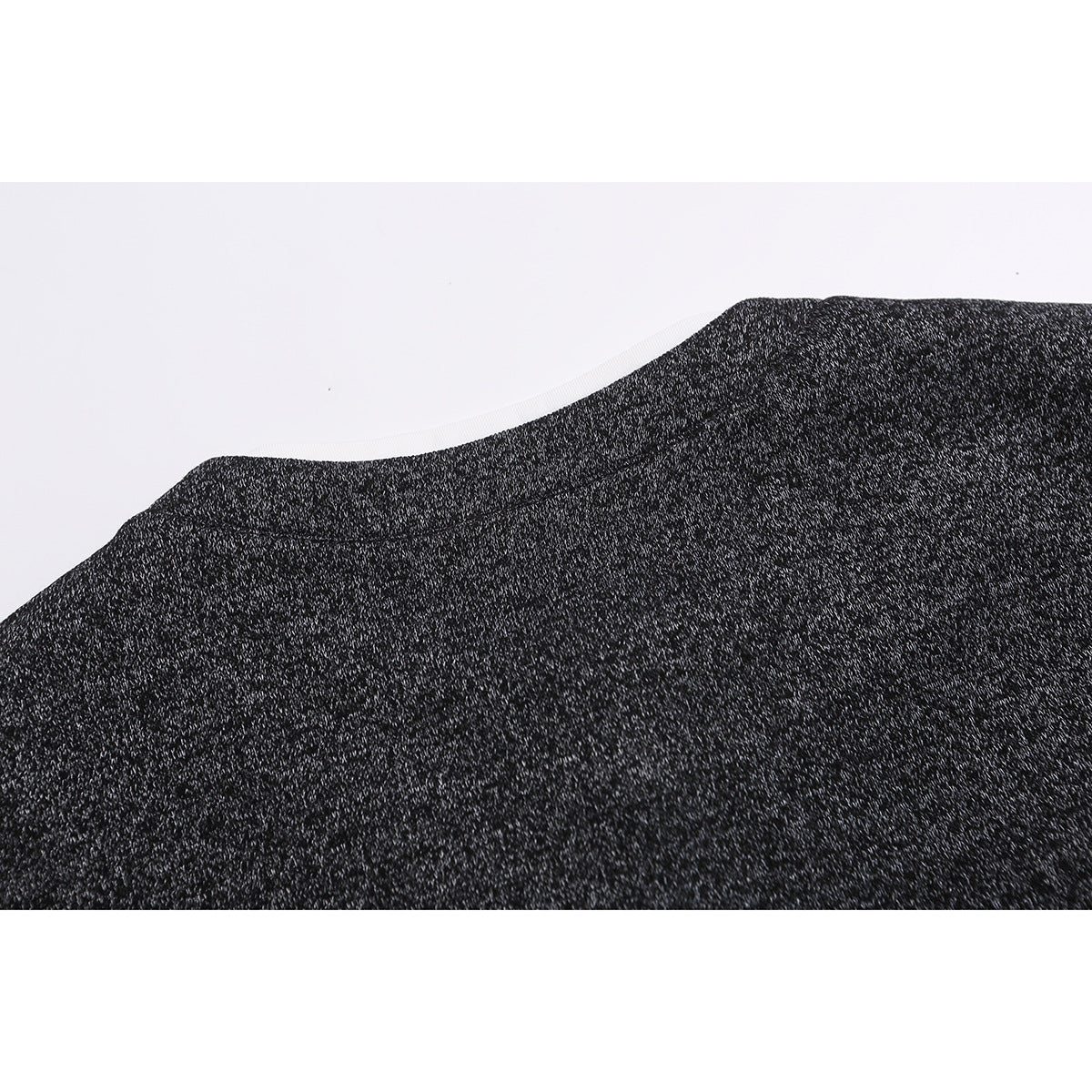 Close-up of the charcoal heather top's back shoulder and neckline.