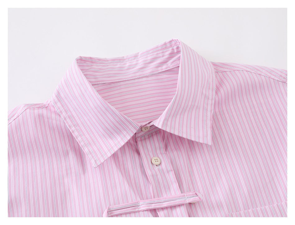 Close-up of a pink and white striped shirt collar, top buttons, and upper chest.