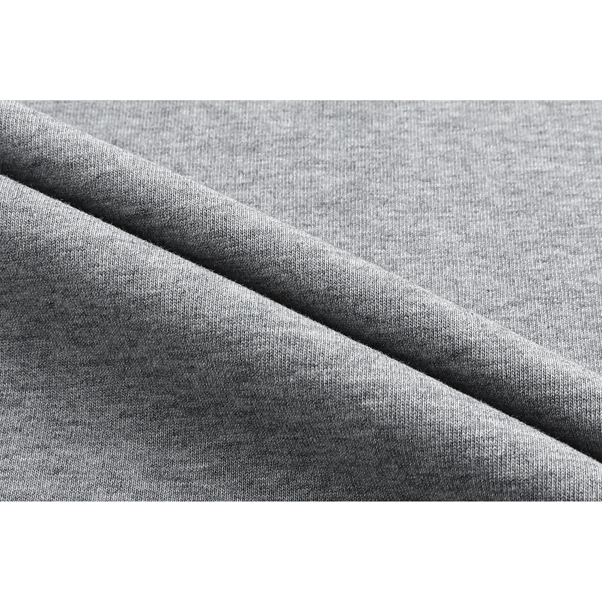 Close-up of heather gray fabric draped in soft folds.