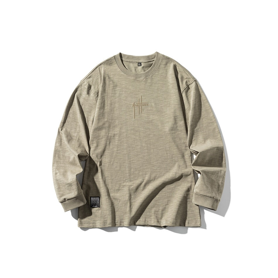 Khaki long-sleeve crew-neck top flat lay with tonal chest lettering and small hem label